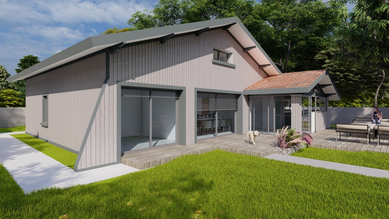 Maison moderne en bois gris avec terrasse, jardin verdoyant et larges baies vitrées coulissantes sous un ciel bleu.